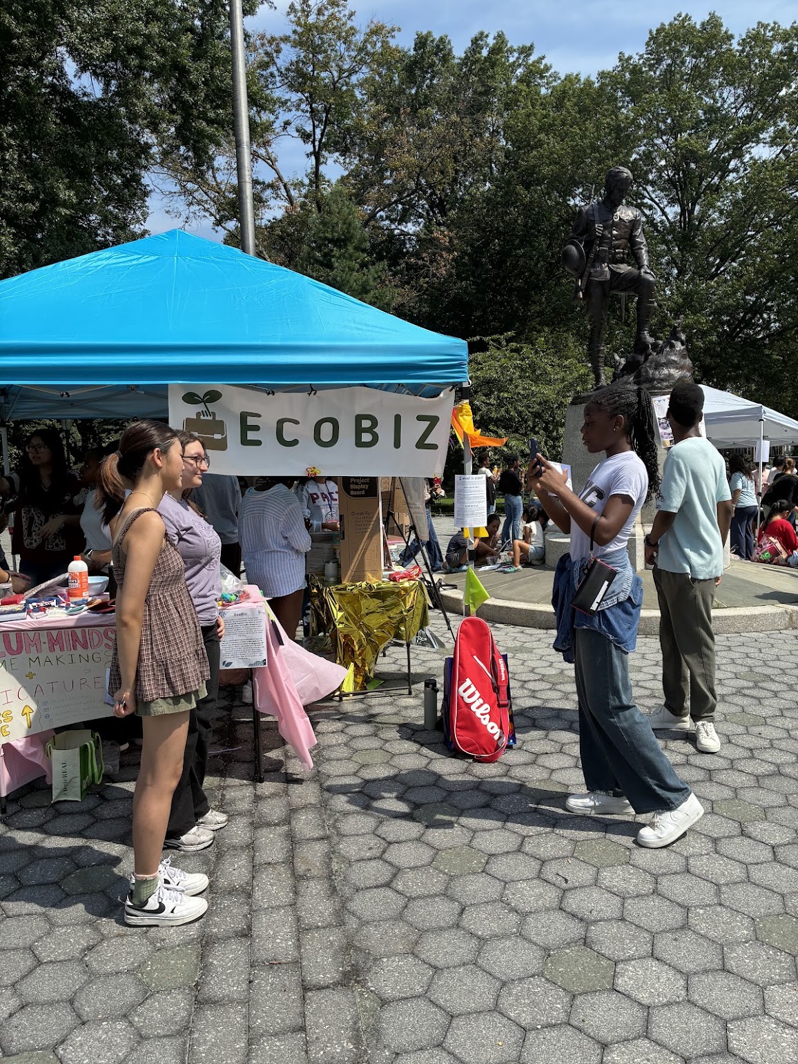 Visitors at the EcoBiz booth during the Summer Advocacy Carnival
